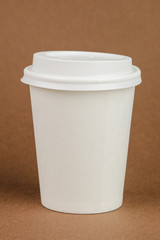 Paper coffee container with white lid. Take-away beverage container. Drink Cup template for your design