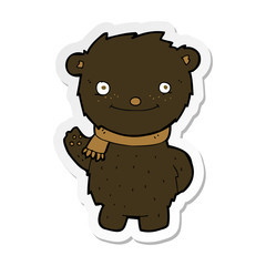 sticker of a cartoon cute black bear