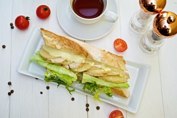 chicken sandwich on a light background