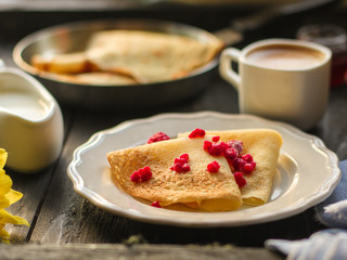pancakes crepes fritters with raspberries (pancakes with filling) Maslenitsa. food background. top view