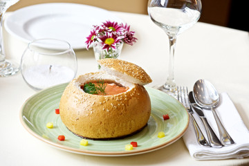 borsch in a plate of white bread