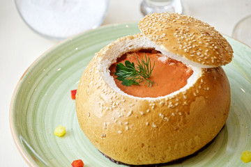 borsch in a plate of white bread