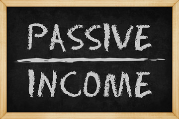 Passive Income chalk text with hand drawn style on blackboard , Concept design for presentations and reports