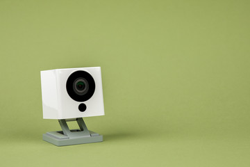 white webcam on green background, object, Internet, technology concept