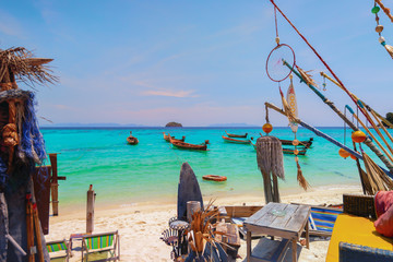 The beach bar in Koh Lipe,Thailand with the crystal clear sea water  and blue sky.