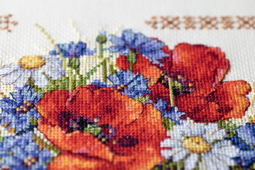 close-up studio shot of flowers embroider cross-stitch pattern