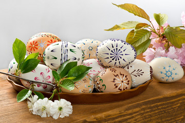 Painted Easter eggs on the wooden desk