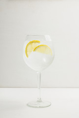 Gin based cocktail in wine glass. Selective focus. Shallow depth of field.