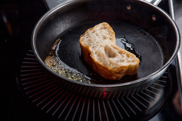the toast is fried in butter in a pan