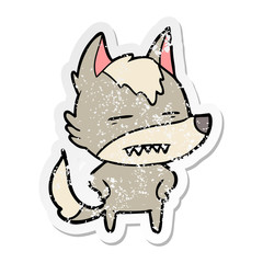 distressed sticker of a cartoon wolf showing teeth
