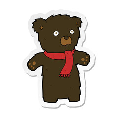 sticker of a cartoon cute black bear