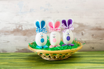 Many decorated Easter eggs as background