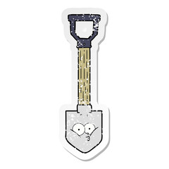 distressed sticker of a cartoon shovel