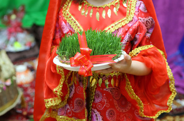 He held his hand in green Semeni . Navruz Nowruz holiday, the spring New Year holiday.