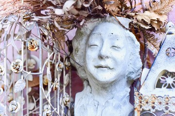 Woman Head Garden Sculpture with Dried Autumn Leaves