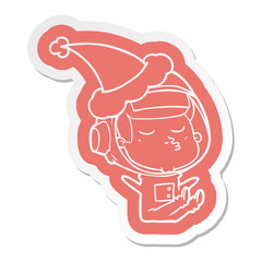 cartoon  sticker of a confident astronaut wearing santa hat