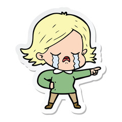 sticker of a cartoon girl crying