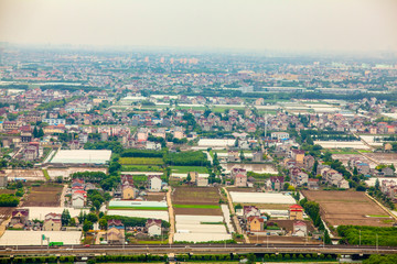 Aerial view of Shanghai Pudong area agricultural land and rural suburban area in China clear day weather