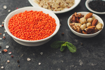 lentils, healthy food concept (legumes, greens, spinach and more) superfood. Food background