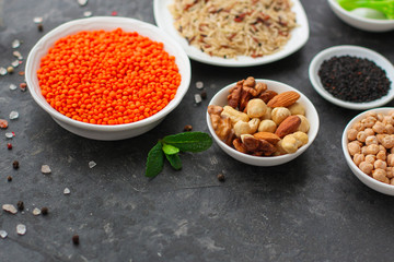 Fototapeta na wymiar lentils, healthy food concept (legumes, greens, spinach and more) superfood. Food background