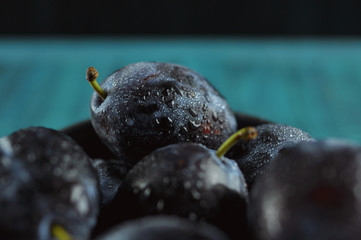 macro style food photography background fresh wet plum