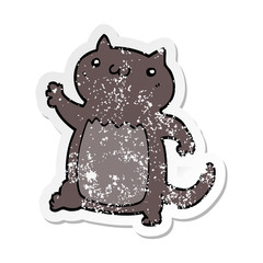distressed sticker of a cartoon cat