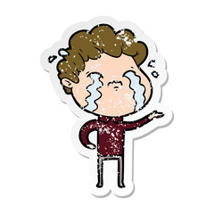 distressed sticker of a cartoon man crying