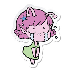sticker of a cartoon crying alien girl