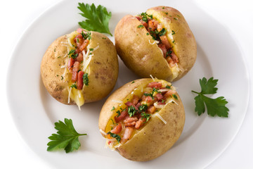 Stuffed potatoes with bacon and cheese on plate isolated on white background. Close up