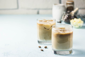 Keto iced bulletproof coffee. Selective focus, space for text.