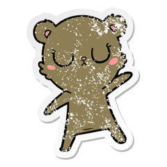 distressed sticker of a peaceful cartoon bear