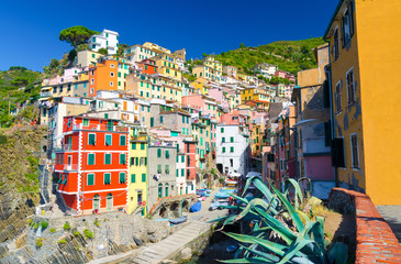 Riomaggiore traditional typical Italian fishing village in National park Cinque Terre, colorful...
