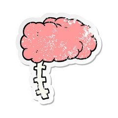 distressed sticker of a cartoon brain