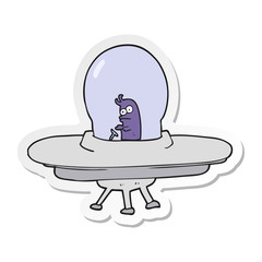 sticker of a cartoon flying saucer