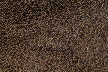 Brown toned weathered leather texture.
