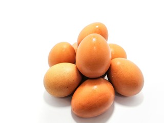 Many eggs on a white background.