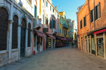 Fototapeta na wymiar Colorful narrow streets of Venice