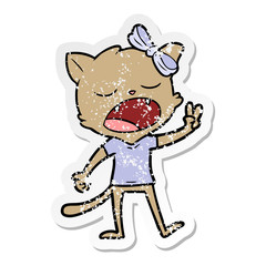 distressed sticker of a cartoon yawning cat