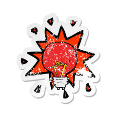 retro distressed sticker of a cartoon red light bulb