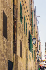 Fototapeta na wymiar VALLETTA, MALTA - June 28, 2017: Typical street view of Valletta in Malta