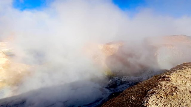 Boivian desert landscape with huge steaming geysers