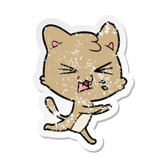 distressed sticker of a cartoon hissing cat