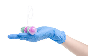 Toilet balls cleaner in cleaning glove hand on white background isolation