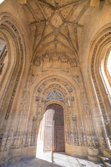 exterior ornamented door with arches of landmark cathedral of San Salvador, gothic monument from thirteenth century, in Oviedo city, Asturias, Spain, Europe