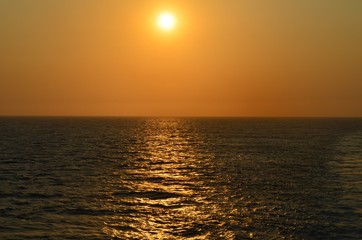 wake trail in the sunset