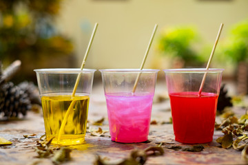 Epoxy resin in cup for casting Stabilizing wood and pine cone hybrid