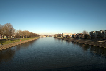 Distant city river bridge background