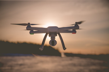 Fototapeta na wymiar radio-controlled drone flies on a clear winter day