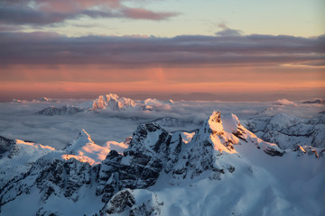 Aerial view of a beautiful Canadian Landscape during a winter sunset. Taken near Squamish, North of Vancouver, British Columbia, Canada.