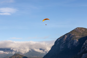 Paraglider flying in Squamish, British Columbia, Canada.